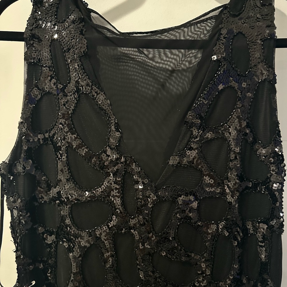 Bebe sequin with mesh mini dress. Black. Size L. NWT.